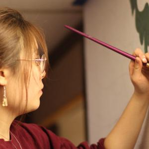 Hannah Kang’22 is one of four student artists commissioned to paint murals in common areas of Peet Hall. The project, created and managed by students, strengthens a sense of place and community in this popular residence hall.